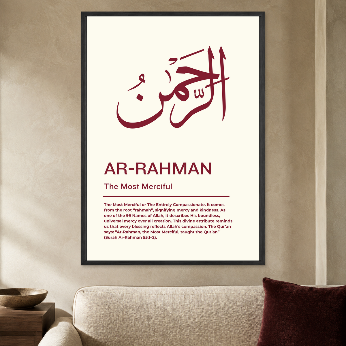 Cream Ar-Rahman wall poster with burgundy Arabic calligraphy and The Most Merciful text in a black frame, styled in a living room