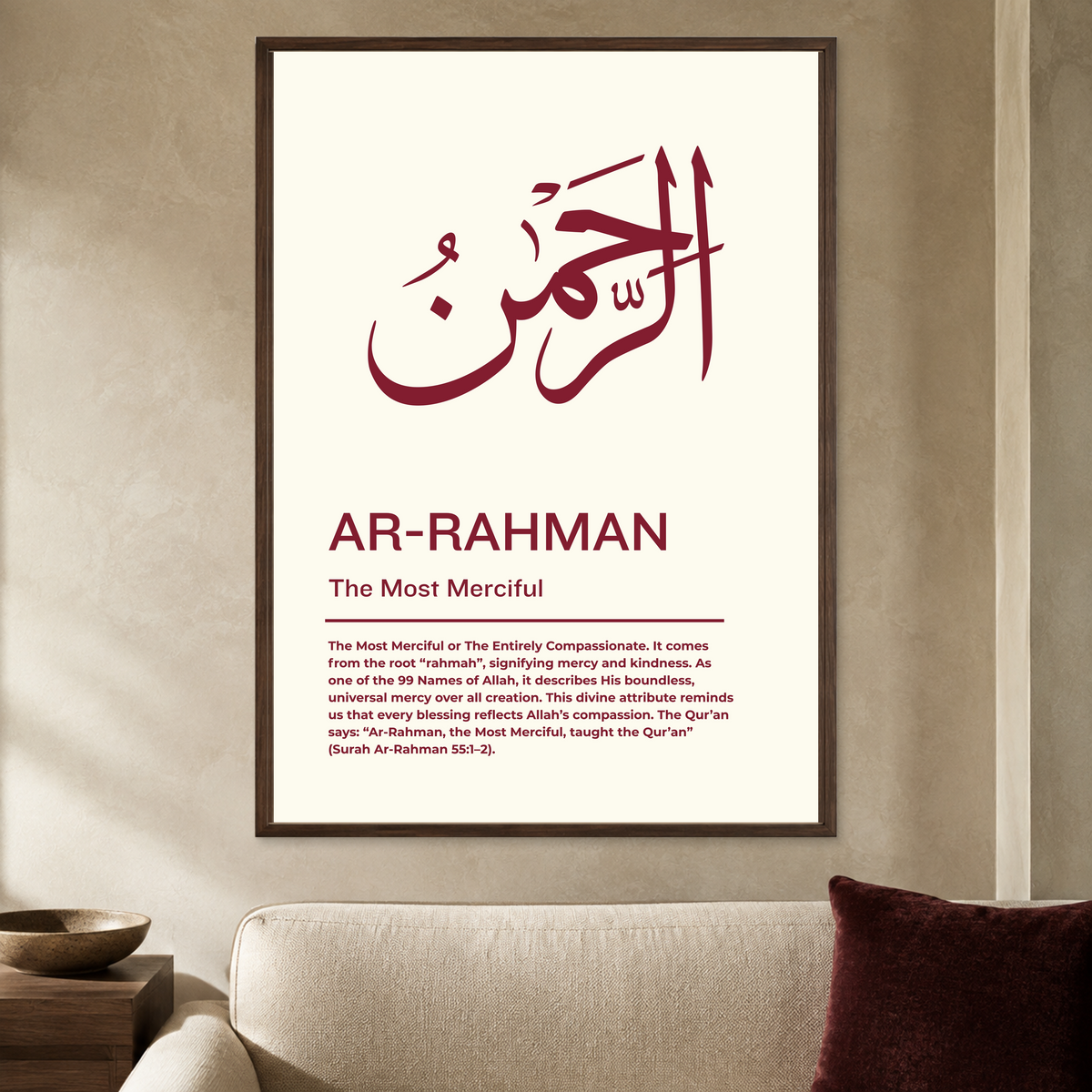 Cream Ar-Rahman wall poster with burgundy Arabic calligraphy and The Most Merciful text in a dark brown frame, styled in a living room